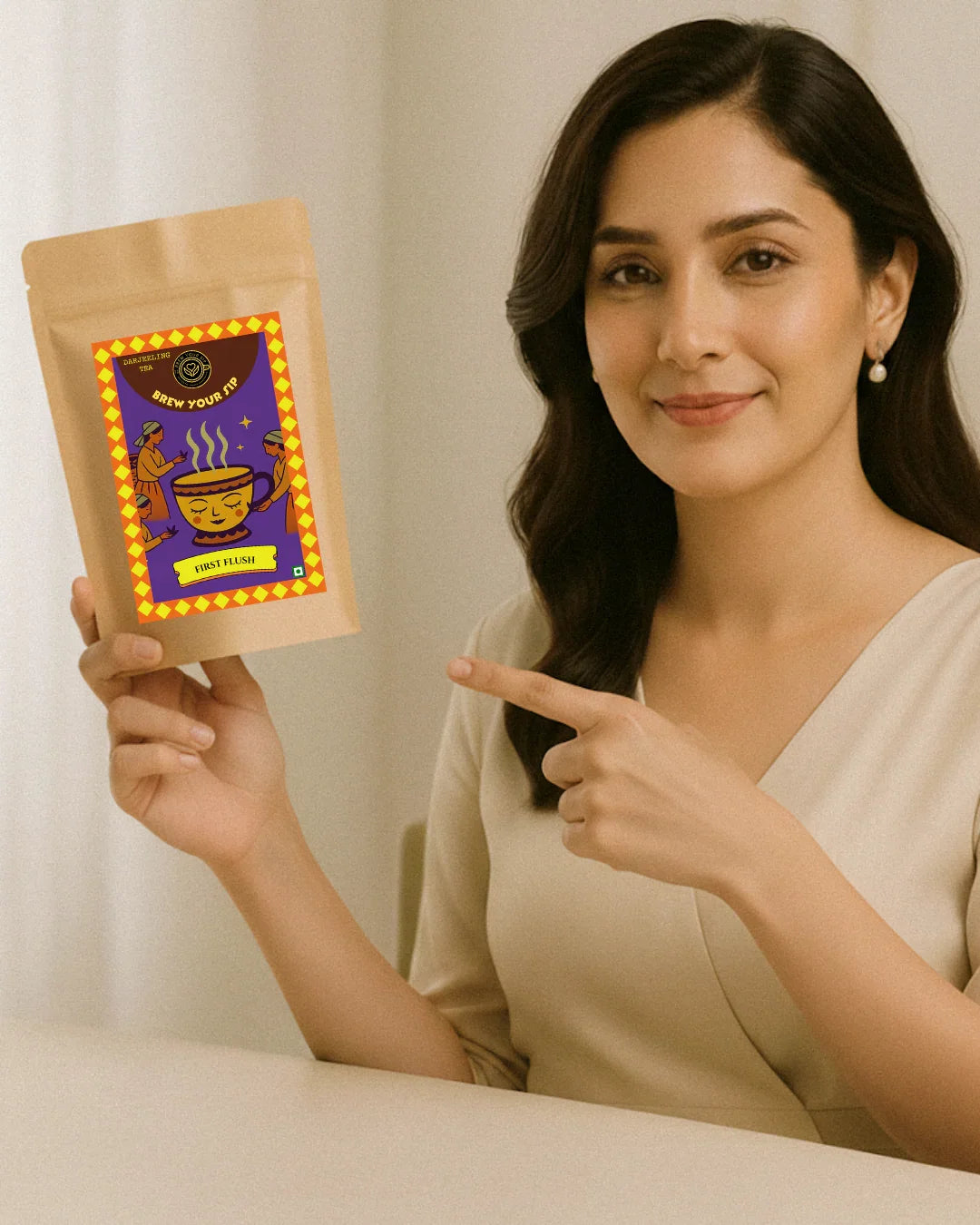 Woman holding and pointing to a brown package with colorful design