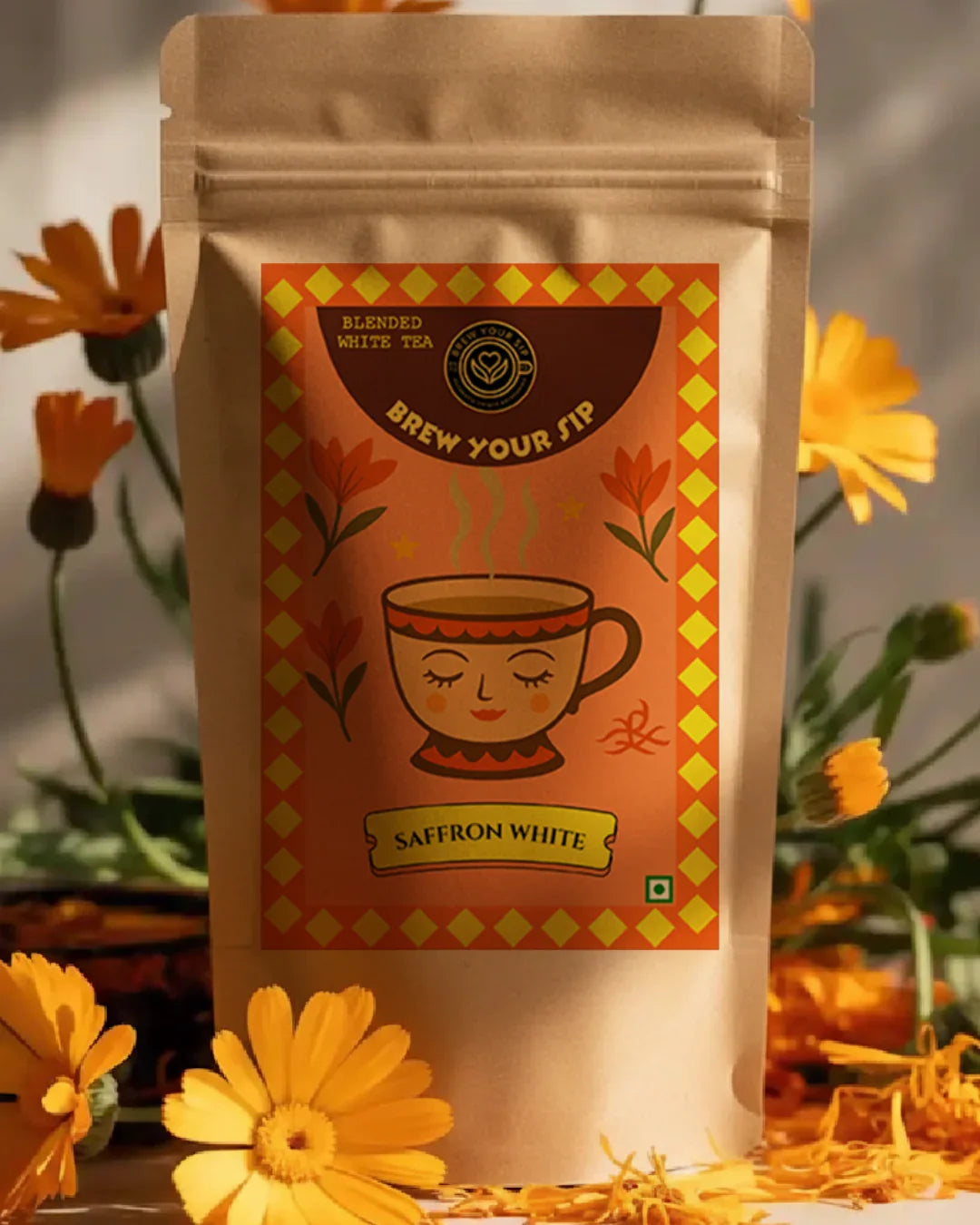 Brew Your Sip's Tea package with a decorative label featuring a cup and saffron flowers in the background