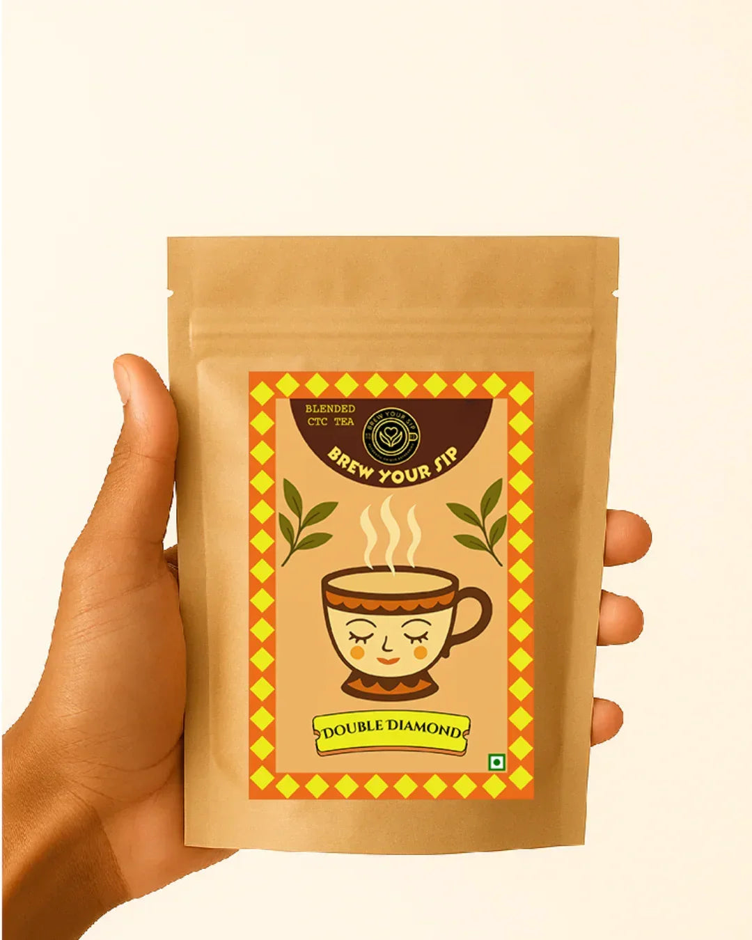 Hand holding a Double Diamond CTC chai by Brew Your Sip