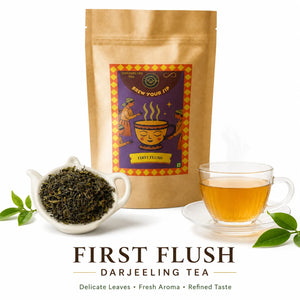 Brew Your Sip First Flush Darjeeling tea pouch beside loose leaves in a white dish and a glass cup of pale golden tea