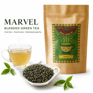 Brew Your Sip Marvel blended green tea pouch with curled green leaves in a white dish and a cup of light green tea