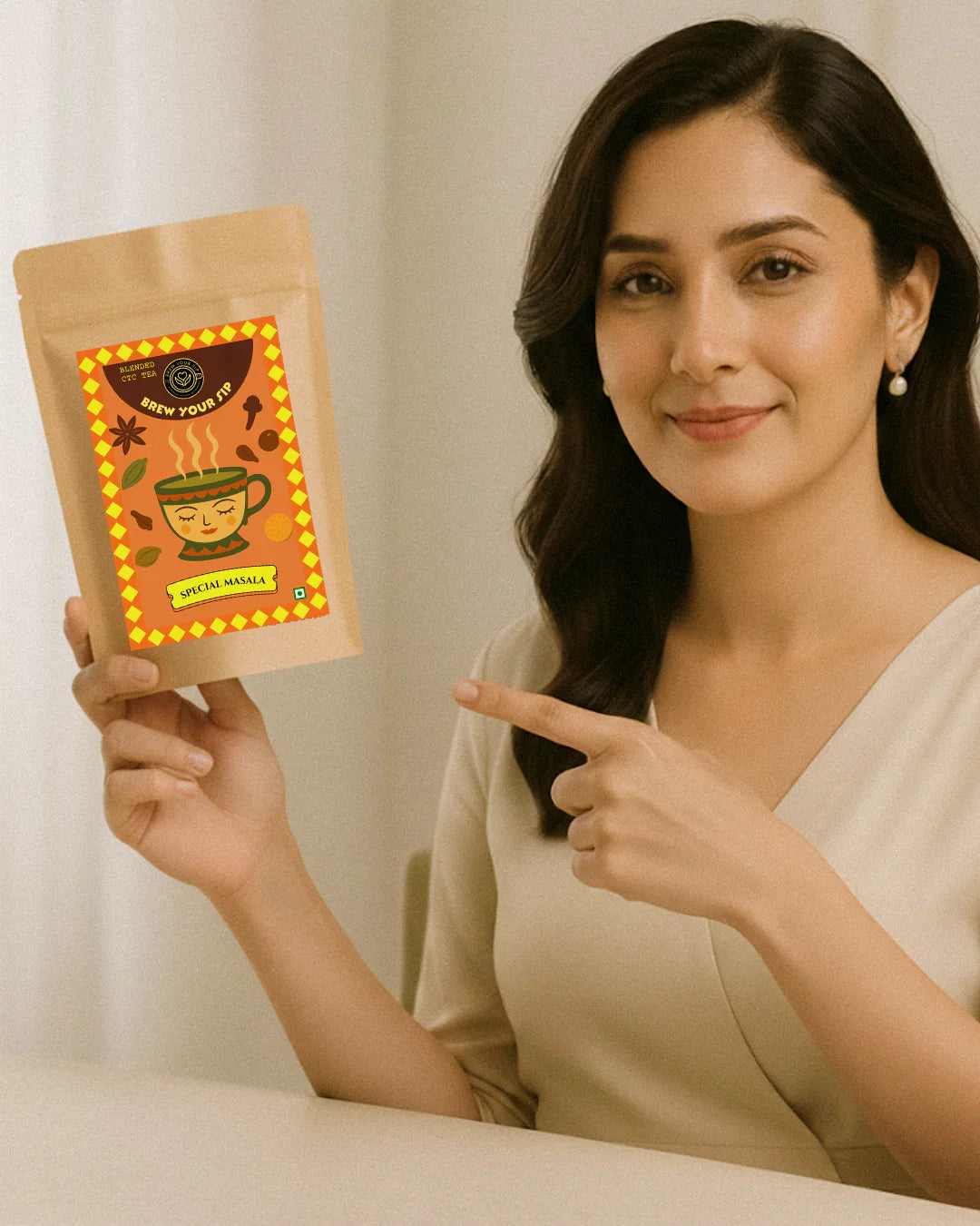 Woman holding and pointing to a brown package with a colorful label.