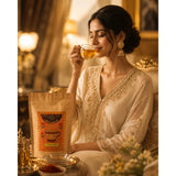 Brew Your Sip Saffron White Tea kraft pouch with real saffron strands – luxury loose leaf white tea India