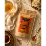 Golden cup of brewed saffron white tea by Brew Your Sip – honey-floral aroma, luxury loose leaf blend India